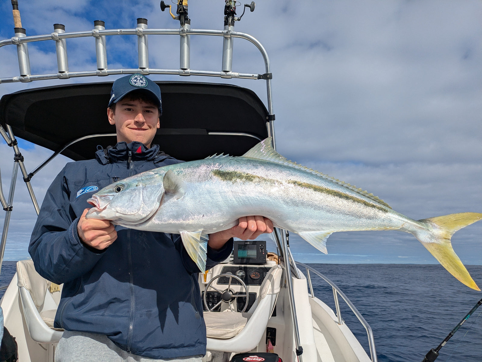 Kingston holding a 98 centimetre kingfish caught on a 150 gram jig off Sydney