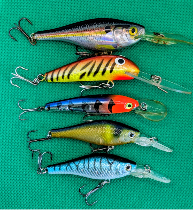Five pre-owned hardbody fishing lures for cod, bass and yellowbelly