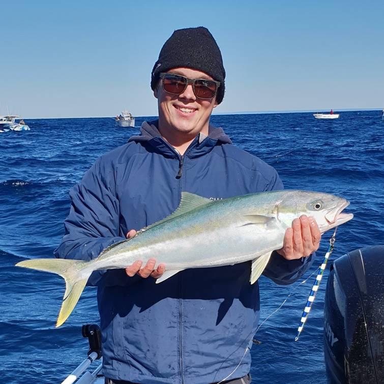 Josh Sumner with a 75 cm kingfish caught by jigging Twelve Mile Reef off Sydney